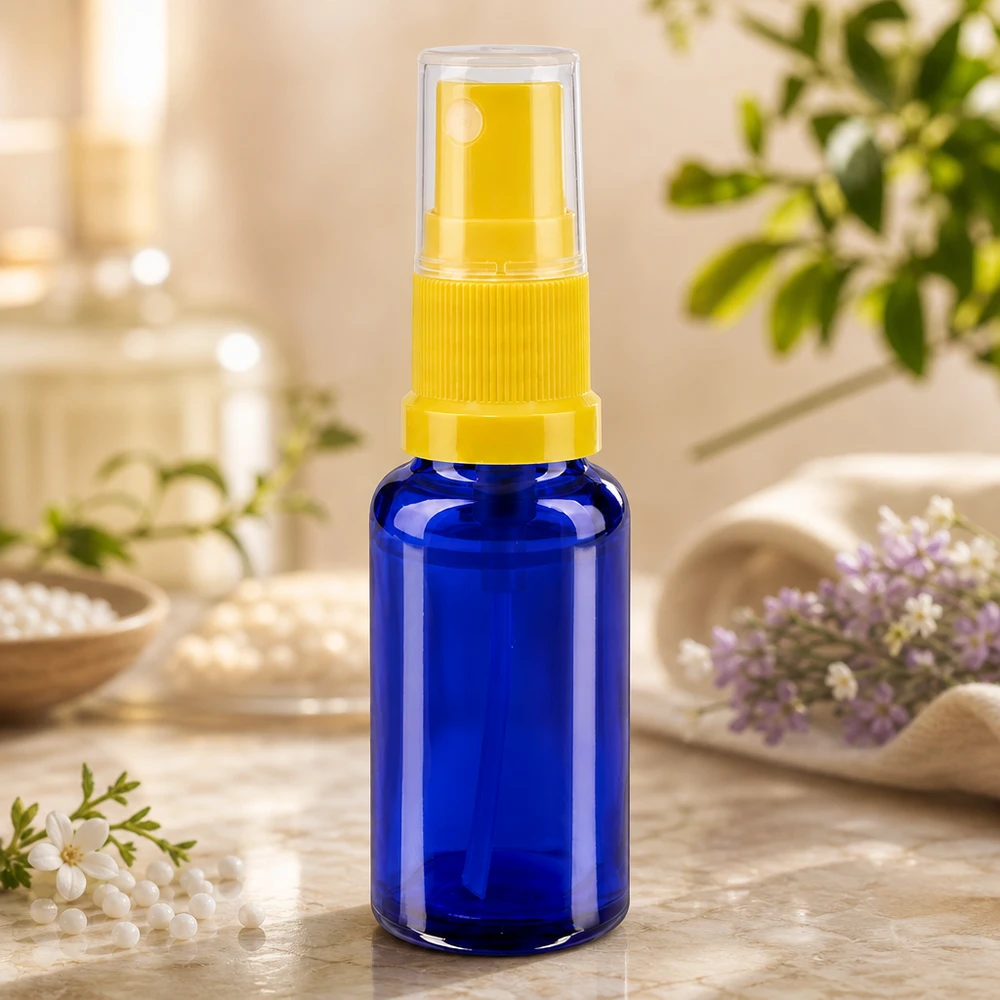 Flacon pulvérisateur compact de 20 ml en verre bleu anti-UV avec pompe jaune, destiné aux pharmacies