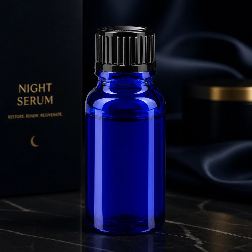 Flacon de pharmacie bleu 10ml bouchon vissable noir standart Élégant flacon de pharmacie bleu cobalt de 10 ml avec bouchon à vis noir, destiné à contenir un sérum de nuit