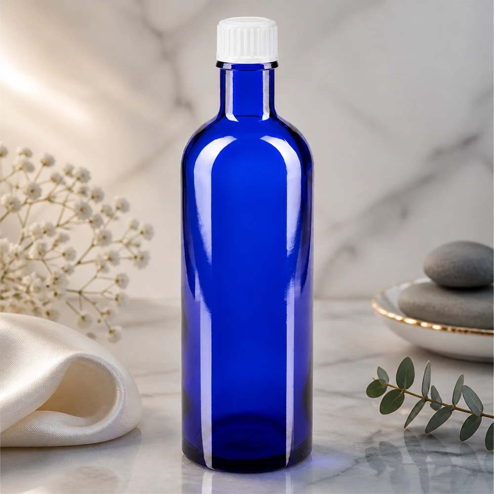 Flacon de pharmacie bleu 200ml bouchon vissable blanc standart Flacon de pharmacie cylindrique de 200 ml, bleu cobalt, avec bouchon à vis en plastique blanc