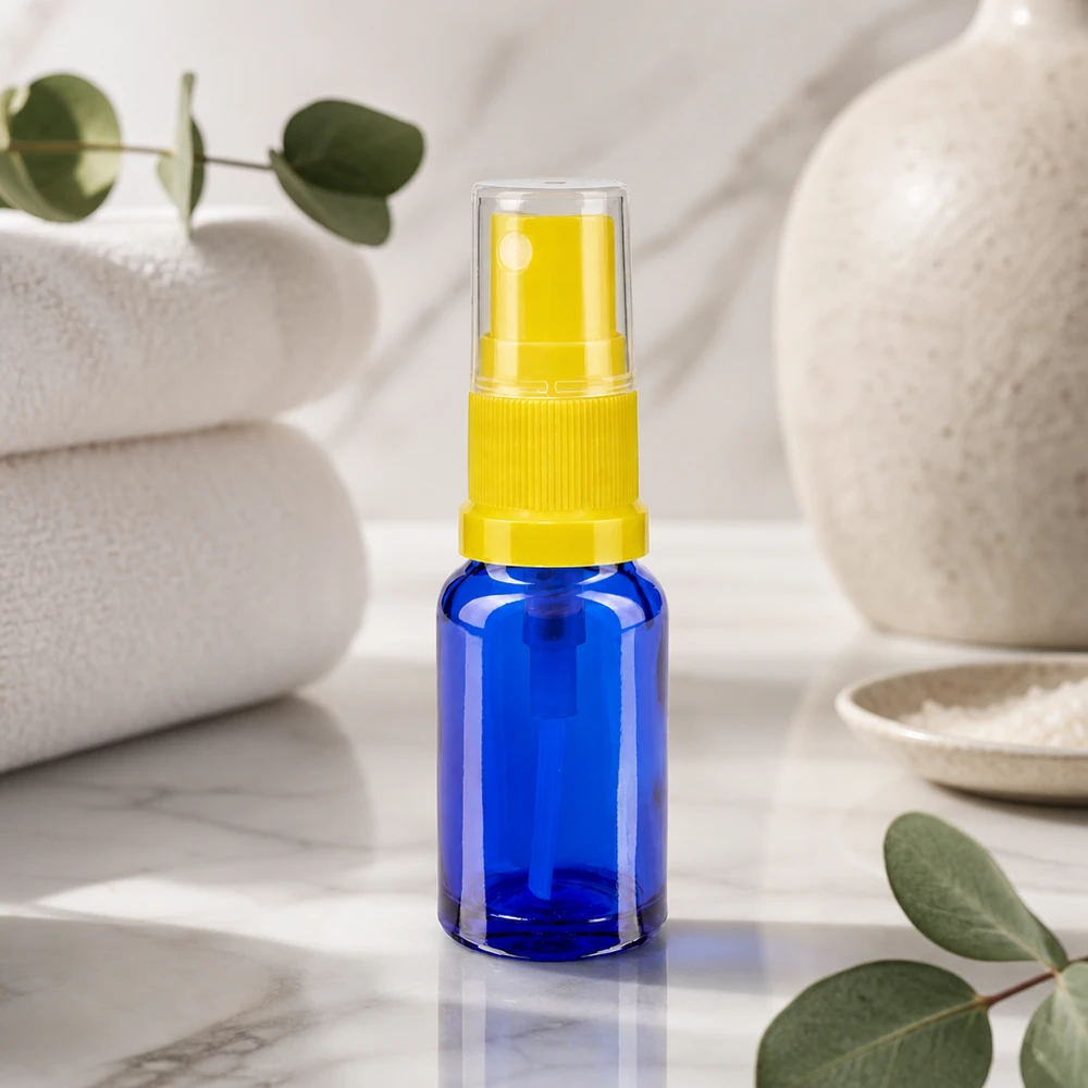 Flacon de pharmacie bleu 30ml embout spray jaune Flacon vaporisateur compact pour pharmacie, en verre bleu, 30 ml, avec tête de vaporisation jaune et bouchon de sécurité