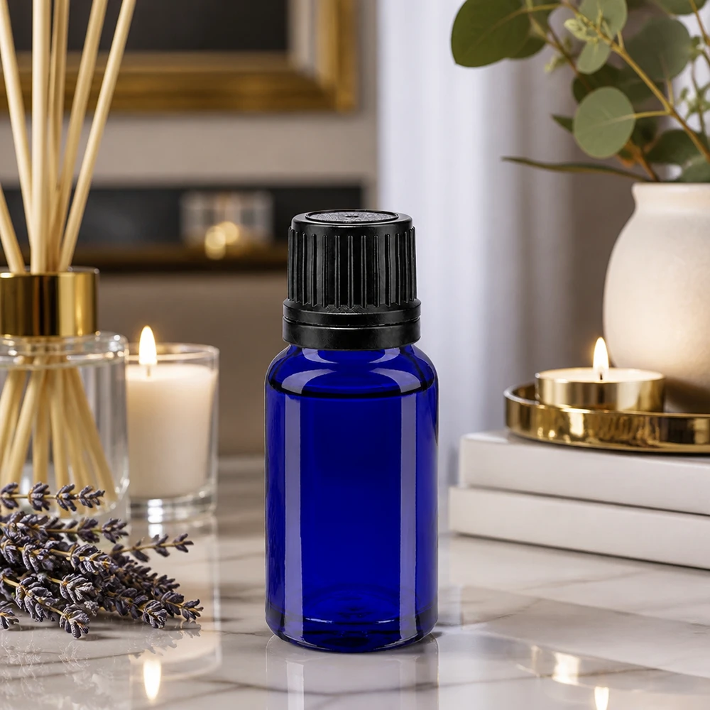 Flacon en verre bleu cobalt de 10 ml avec bouchon d'origine noir, destiné aux huiles essentielles et à l'aromathérapie