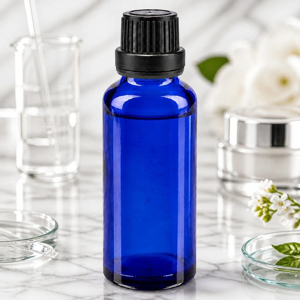Flacon de pharmacie bleu 30ml bouchon vissable noir bouchon inviolabilité Flacon compte-gouttes bleu foncé de 30 ml en verre de pharmacie, muni d'un bouchon à vis de sécurité enfant de 11 mm