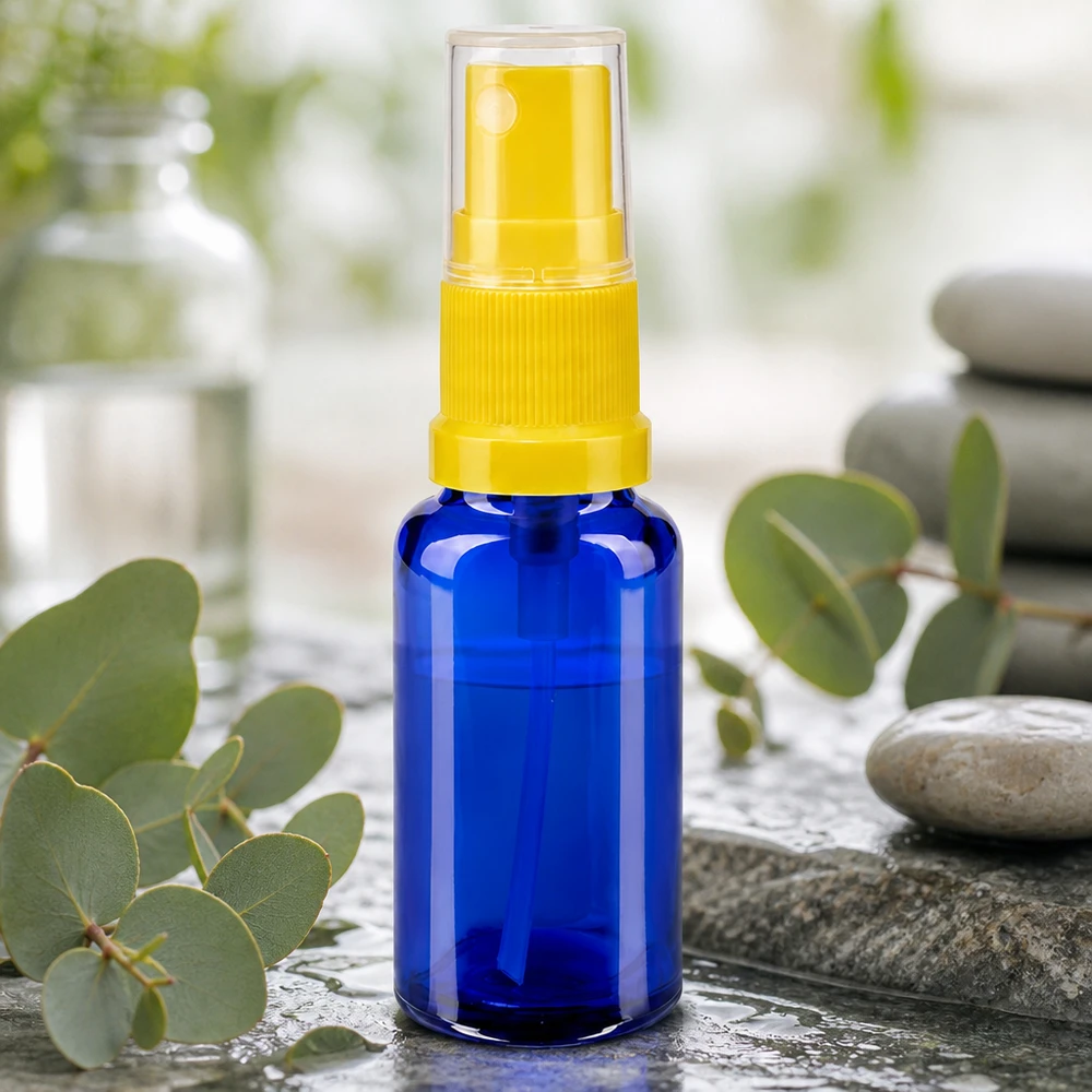 Flacon de pharmacie bleu 20ml embout spray jaune Flacon pulvérisateur compact de 20 ml en verre de protection bleu avec pompe pulvérisatrice jaune, destiné aux pharmacies
