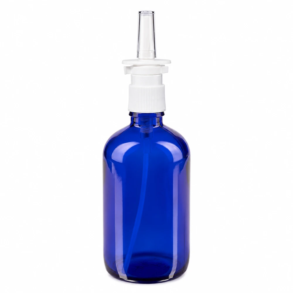 Flacon de pharmacie bleu 100ml vaporisateur nasal blanc standard Flacon de spray nasal bleu de 100 ml en verre d'apothicaire, muni d'un embout pulvérisateur blanc et d'une buse transparente