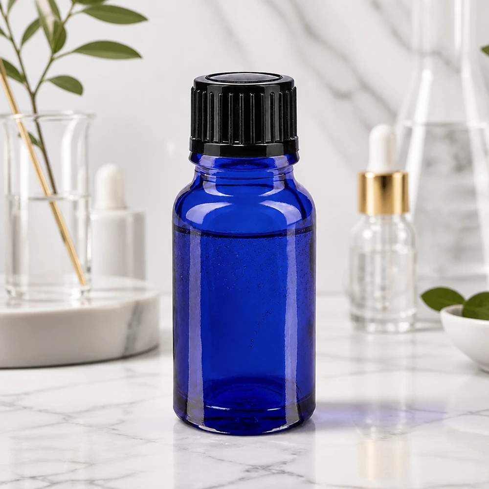 Flacon en verre bleu de 10 ml à ouverture précise de 1 mm, muni d'un bouchon rainuré noir, destiné aux applications de laboratoire