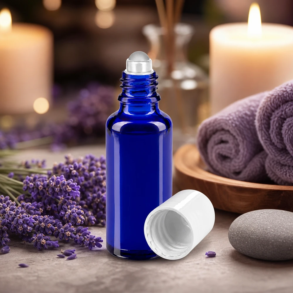 Flacon roll-on de 30 ml en verre d'apothicaire bleu cobalt avec bouchon standard blanc