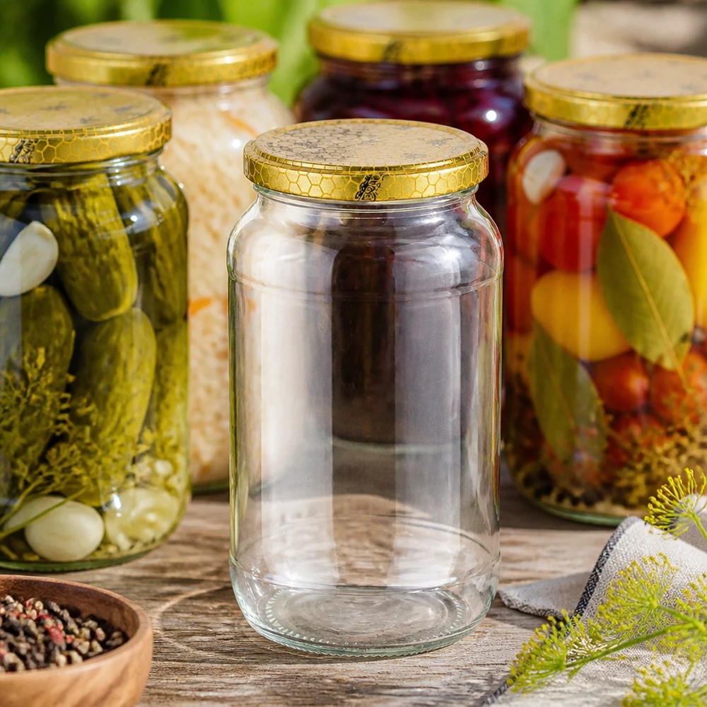 1062ml Verre rond avec couvercle BasicSeal nid d'abeilles UNiTWIST 1062ml Bocal rond vide entre les bocaux remplis de cornichons Légumes Couvercle en nid d'abeille doré Conserves