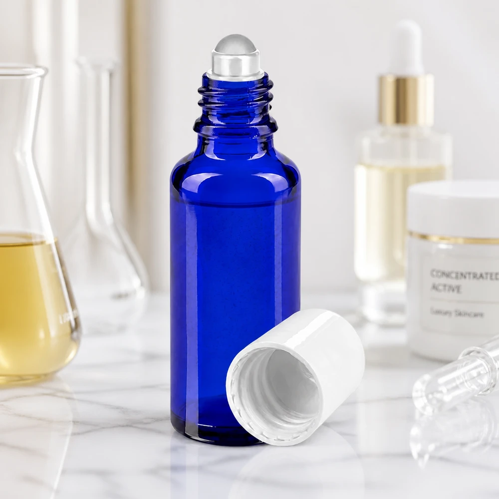 Flacon de pharmacie bleu 30ml Roll-On bouchon blanc Flacon à bille bleu de 30 ml en verre d'apothicaire, muni d'une bille en verre transparente et d'un bouchon de protection blanc