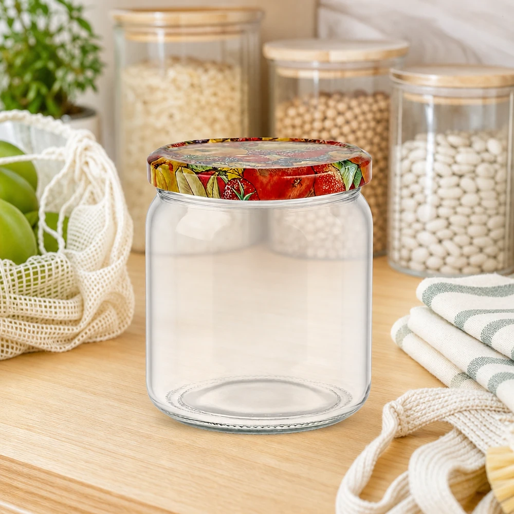 408ml Verre rond avec couvercle BasicSeal décor fruits UNiTWIST Bocal rond vide de 408ml avec couvercle BasicSeal décor fruits à côté des bocaux à provisions durables et des sacs en coton