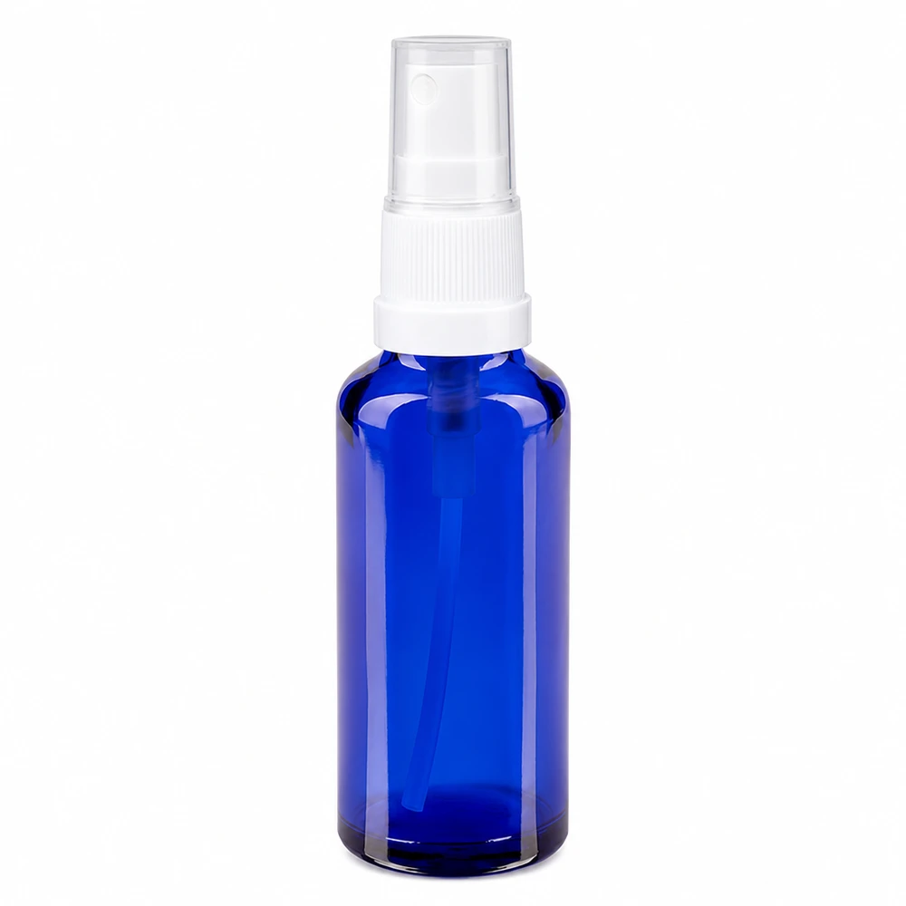 Flacon de pharmacie bleu 30ml embout spray blanc Flacon vaporisateur de 30 ml en verre d'apothicaire bleu, muni d'une pompe vaporisatrice blanche et d'un capuchon de protection transparent