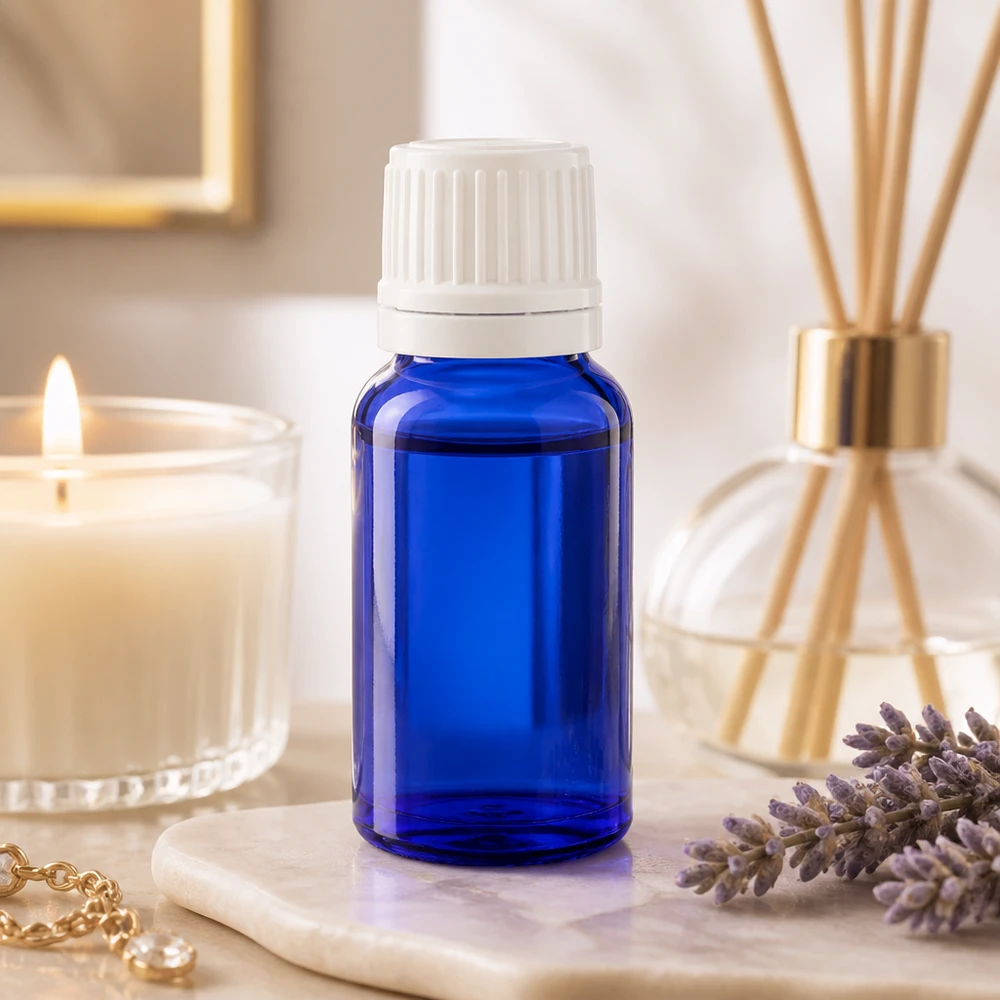Flacon compte-gouttes de 10 ml en verre d'apothicaire bleu cobalt, muni d'un bouchon de sécurité blanc
