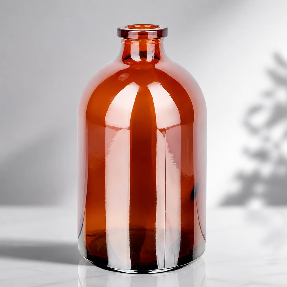 Flacon pour solution injectable, 100 ml en verre ambré Sterile Glasflasche 100ml in Bernsteinfarbe mit charakteristischer Apothekerflasche-Silhouette