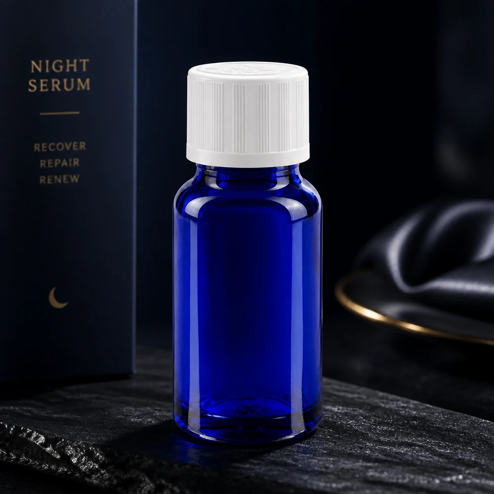 Flacon de pharmacie bleu 10 ml avec bouchon vissable blanc avec sécurité enfant standard Flacon de pharmacie bleu de 10 ml muni d'un bouchon de sécurité blanc pour enfants, destiné à l'emballage du sérum de nuit