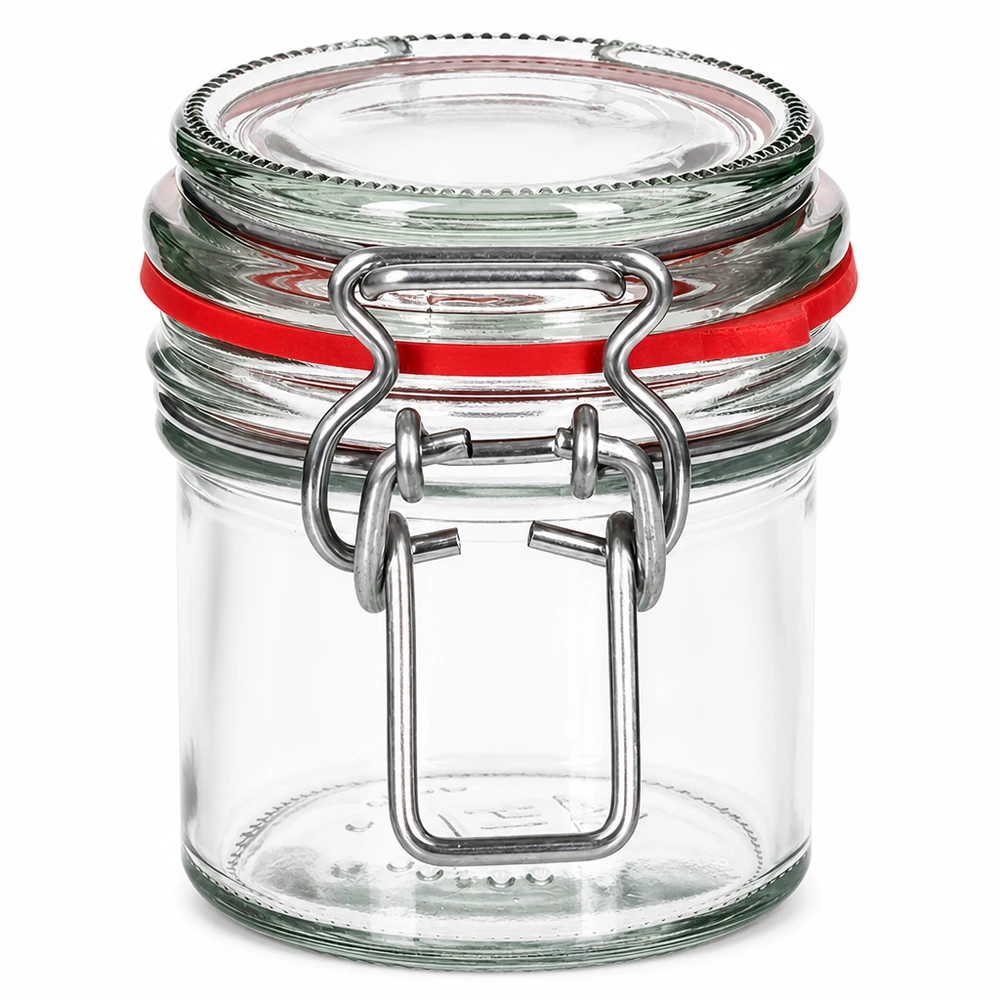 Pot à provisions vide de 135 ml avec fermeture à étrier et joint en caoutchouc rouge en verre transparent sur fond blanc