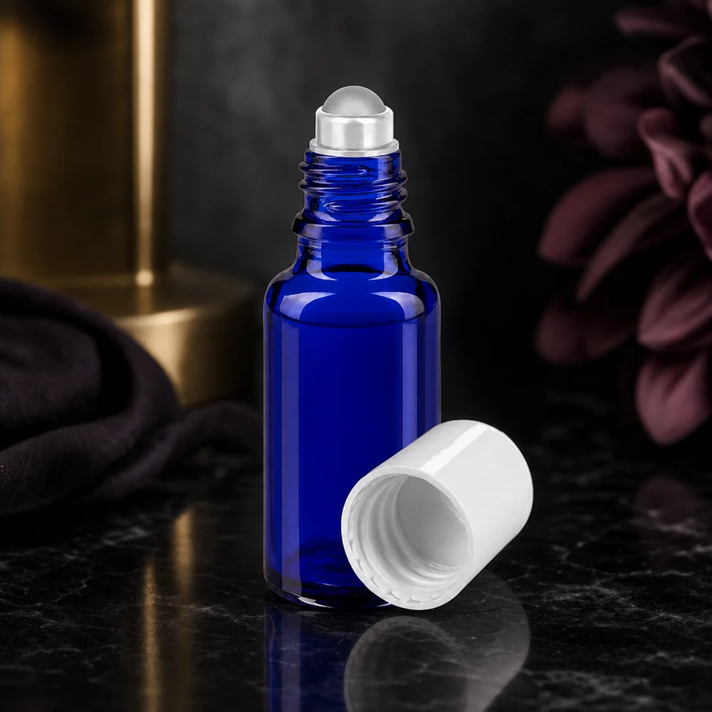 Flacon roll-on bleu de 20 ml avec bouchon à vis blanc, en verre de pharmacie de haute qualité, s'ouvrant sur le côté